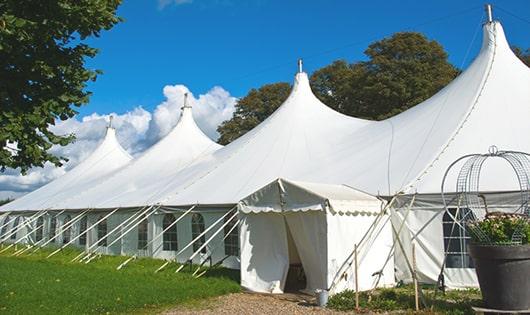 high-quality portable restrooms stationed at a wedding, meeting the needs of guests throughout the outdoor reception in Fox River Grove